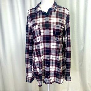 Daytrip size Medium flannel design top with cute cutout design in the back